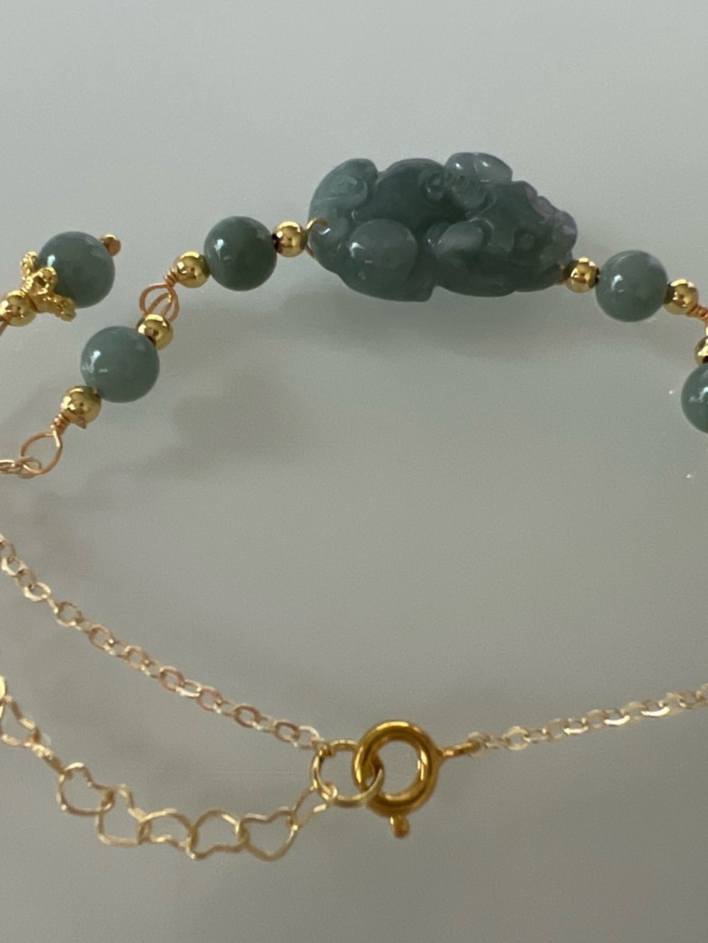 Gold Chain Bracelet with Green Jade Beads and Carved Jade Accent